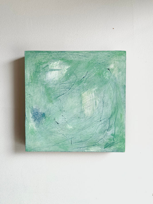 Green and White Abstract on Board